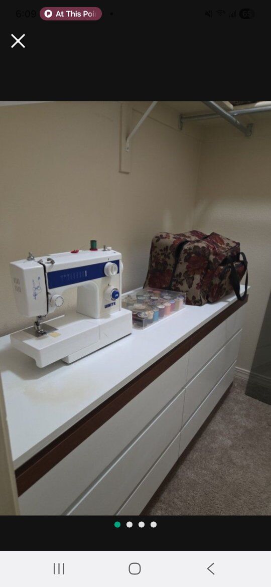 sewing machine, thread, carry/storage bag