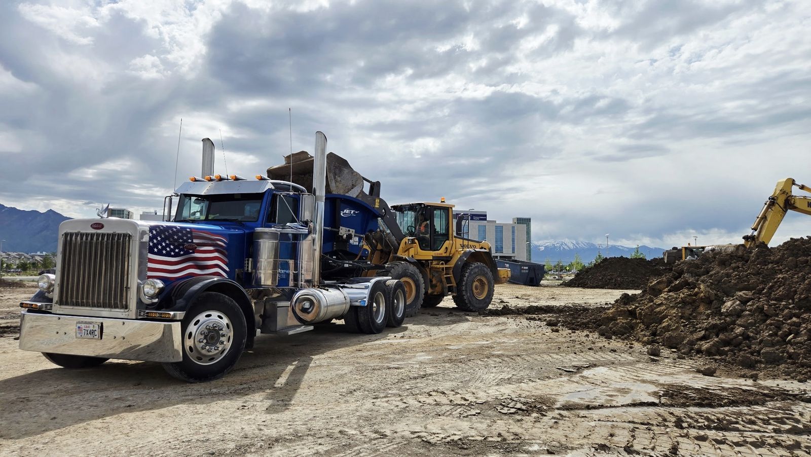 Used Peterbilt Semi Truck with American Flag Decal, Blue Exterior