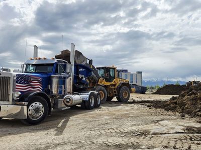 Used Peterbilt Semi Truck with American Flag Decal, Blue Exterior