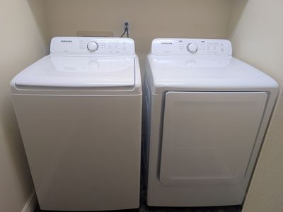 White Samsung Top-Loader Washer & Gas Dryer Set