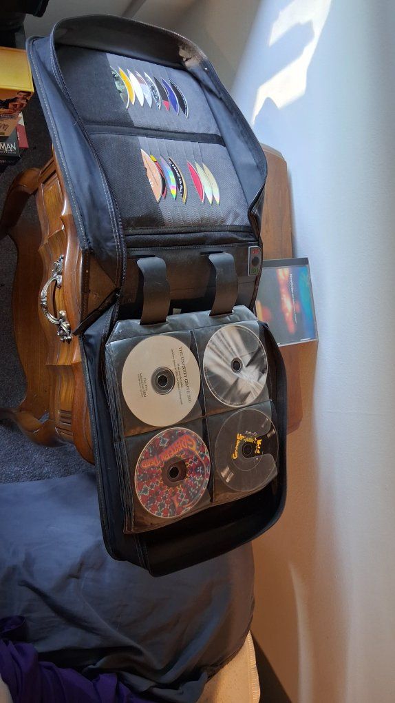 CD/DVD Holder Case with Assorted Music CDs - Black, Holds 40+ Discs