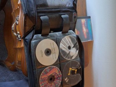 CD/DVD Holder Case with Assorted Music CDs - Black, Holds 40+ Discs