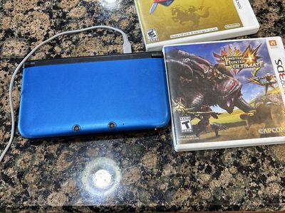 Nintendo 3DS XL Console Blue with Legend of Zelda & Monster Hunter Ultimate Games