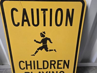 caution children playing metal sign