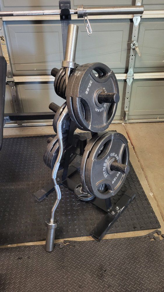 Bench and 255 pounds of weights