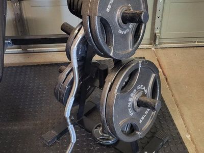 Bench and 255 pounds of weights
