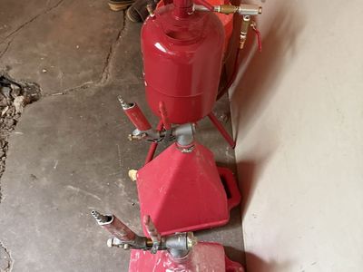 Drywall hopper and gun two of them 20 bucks apiece