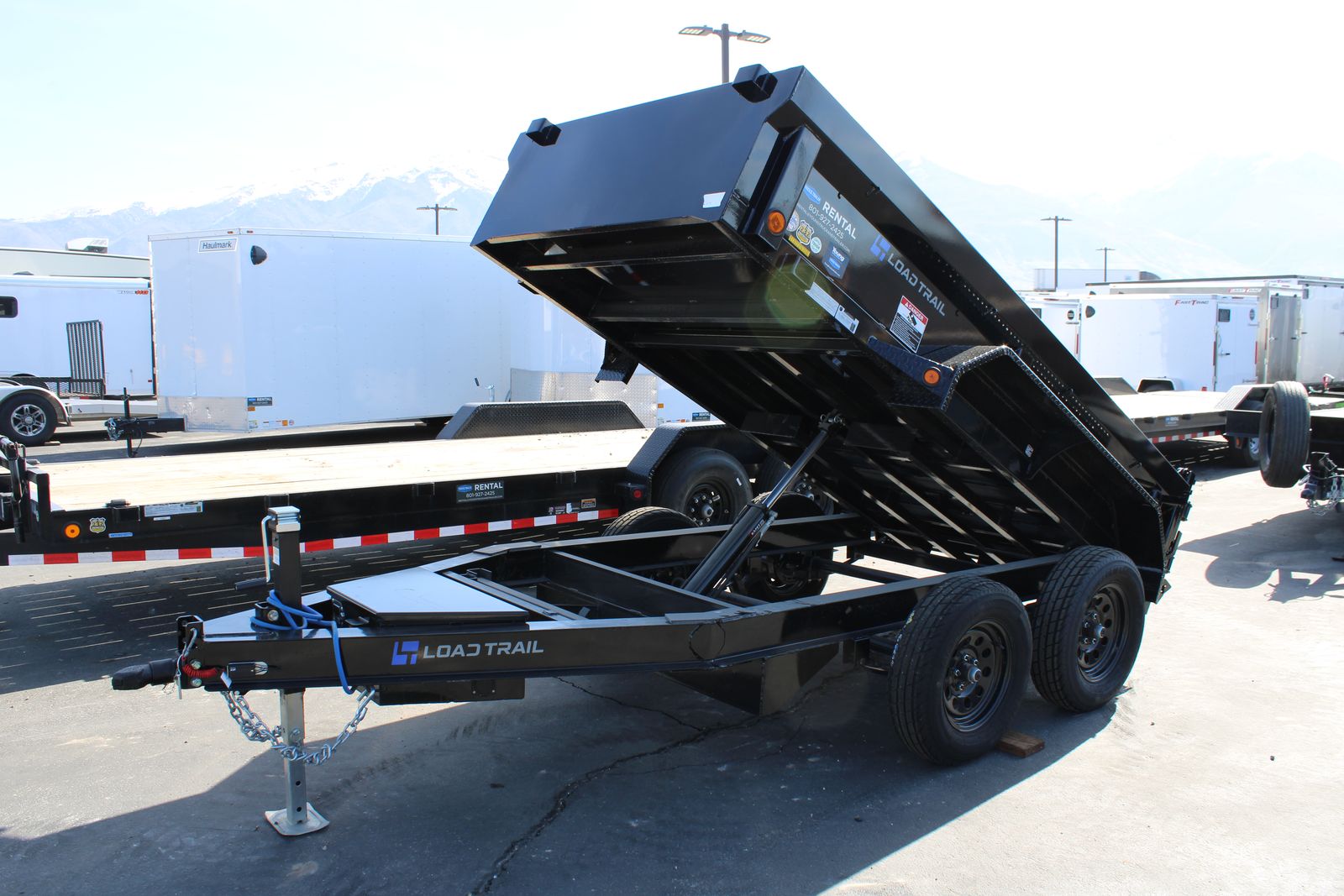 5X10 DUMP TRAILER - LOAD TRAIL - $50