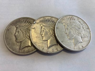 3 silver peace dollars