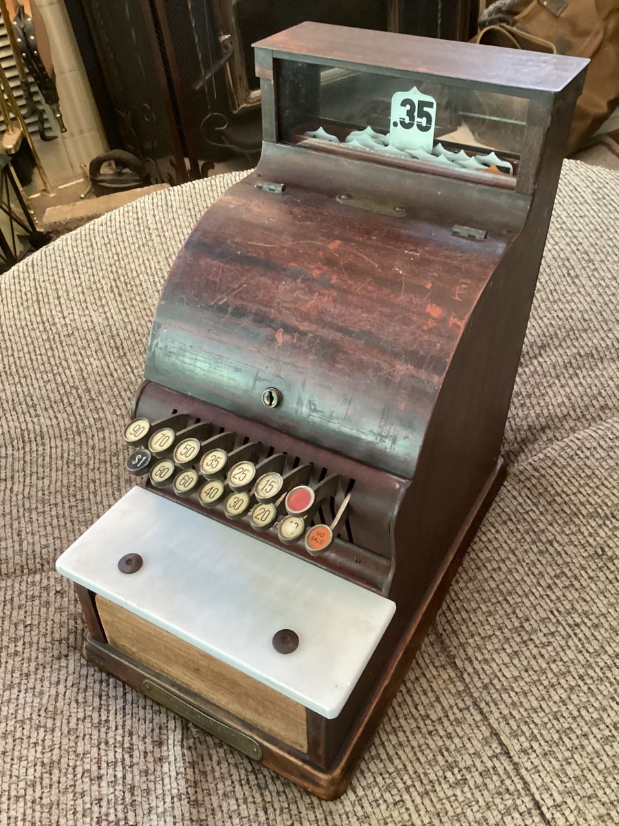 Vintage cash register from drugstore, tobacco-candy counter.