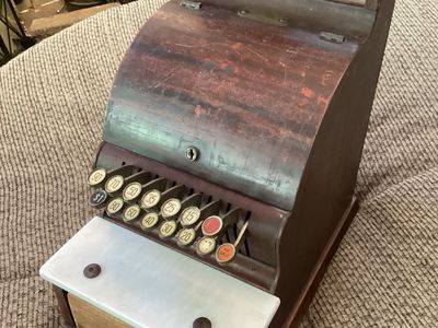 Vintage cash register from drugstore, tobacco-candy counter.