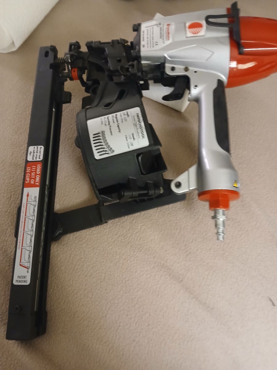 FastenMaster air gun for installing hidden clips