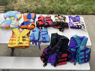 Life Jackets various, wet suits for kids, and gloves for kids