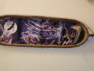 Canoe with 4 painted plates