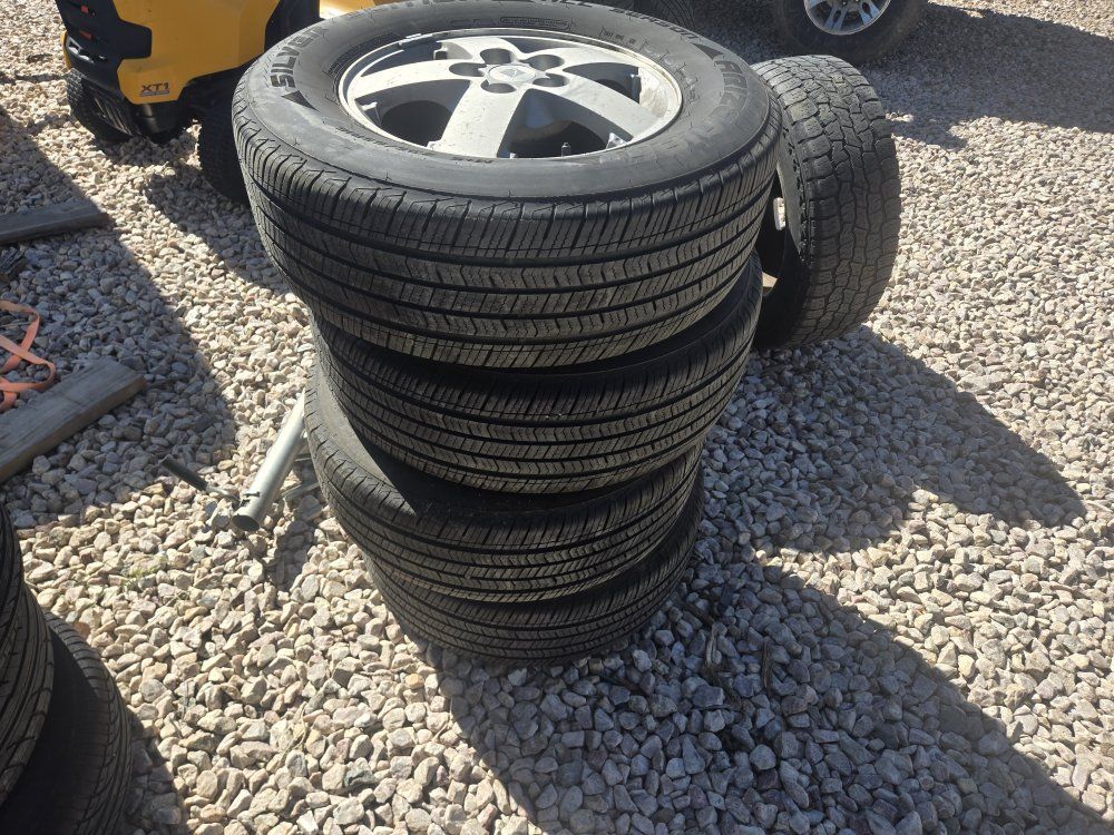 Set of 235 65 16" Tires on Saturn Alloy Wheels