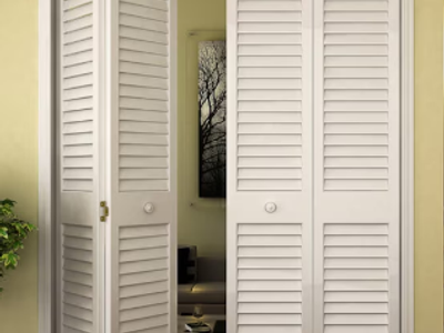 32-in x 80-in White Louver Smooth Solid core Primed Pine Wood Plantation Bifold Closet Door