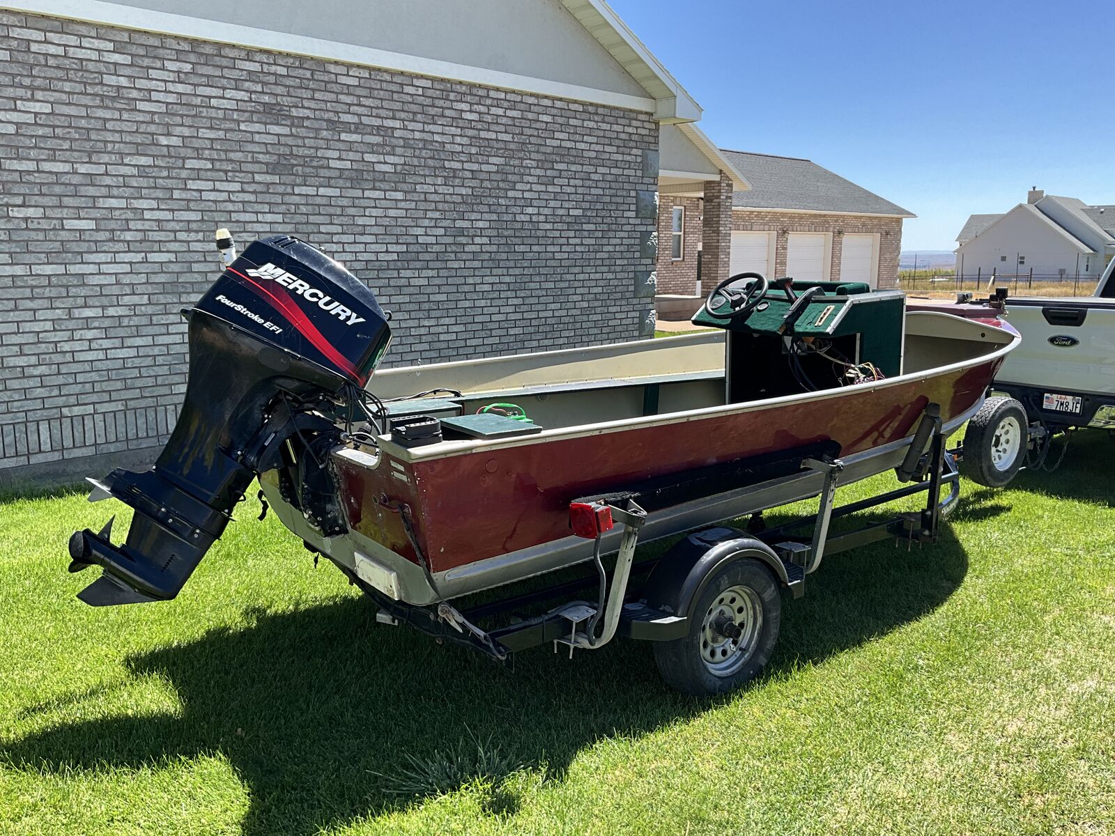 Boat, 16 foot Lund, 60 HP Mercury