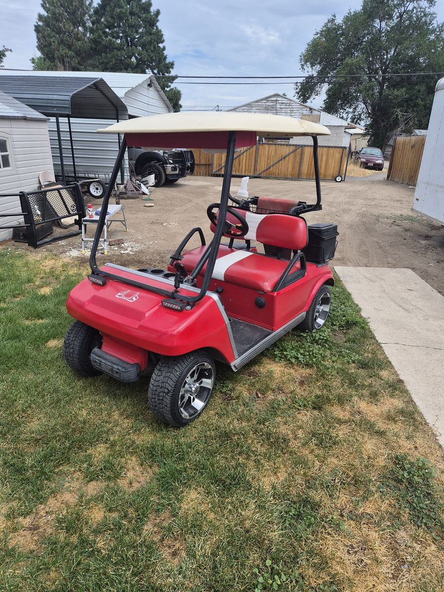 $3500 obo - 2001 Gas Powered Club Car DS with cover, heater, and trailer