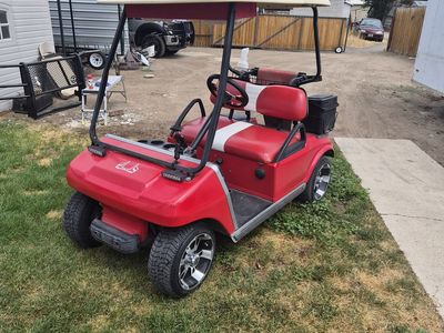 $3500 obo - 2001 Gas Powered Club Car DS with cover, heater, and trailer