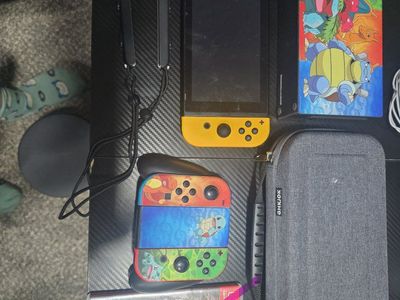 Nintendo Switch with game and other accessories