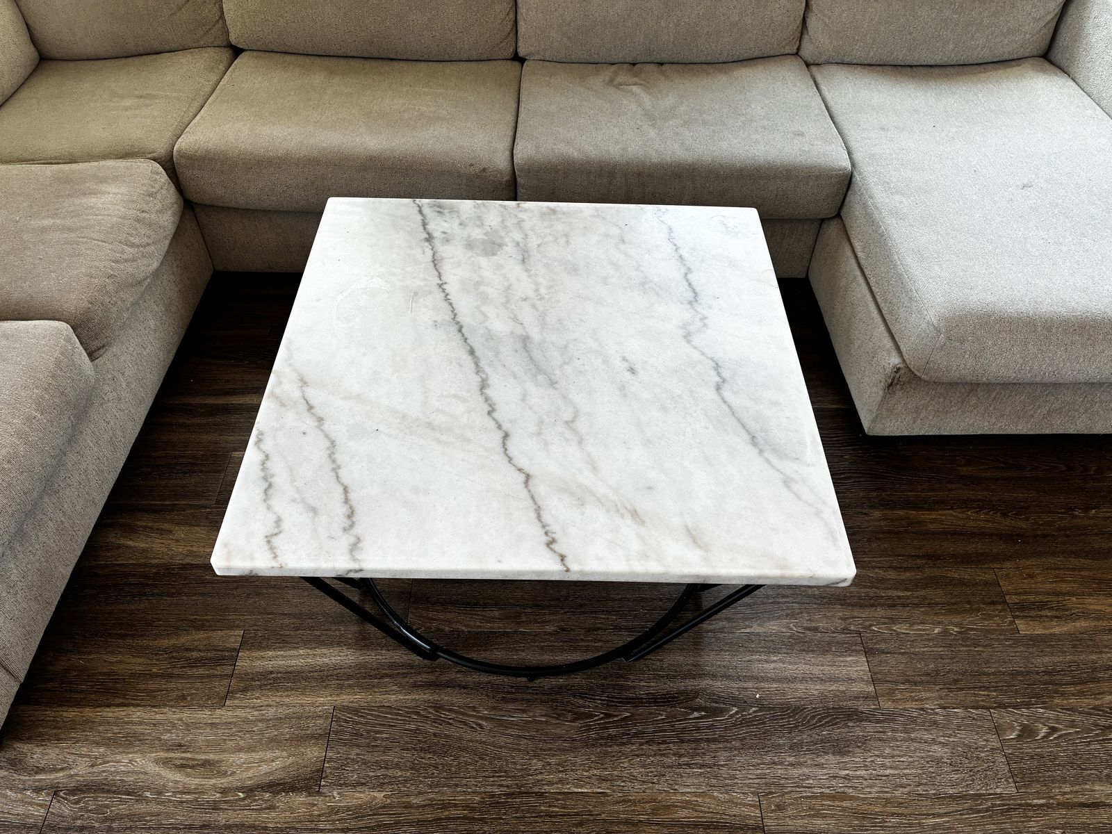 Industrial Art house coffee table. White Carrera Marble