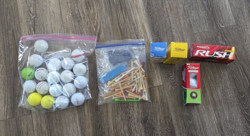 New Titleist and Pinnacle Golf balls and Tees