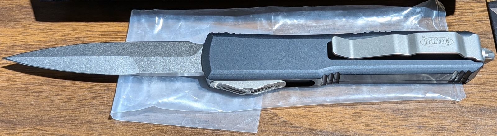 New, never carried, 25th anniversary edition Microtech Ultratech OTF