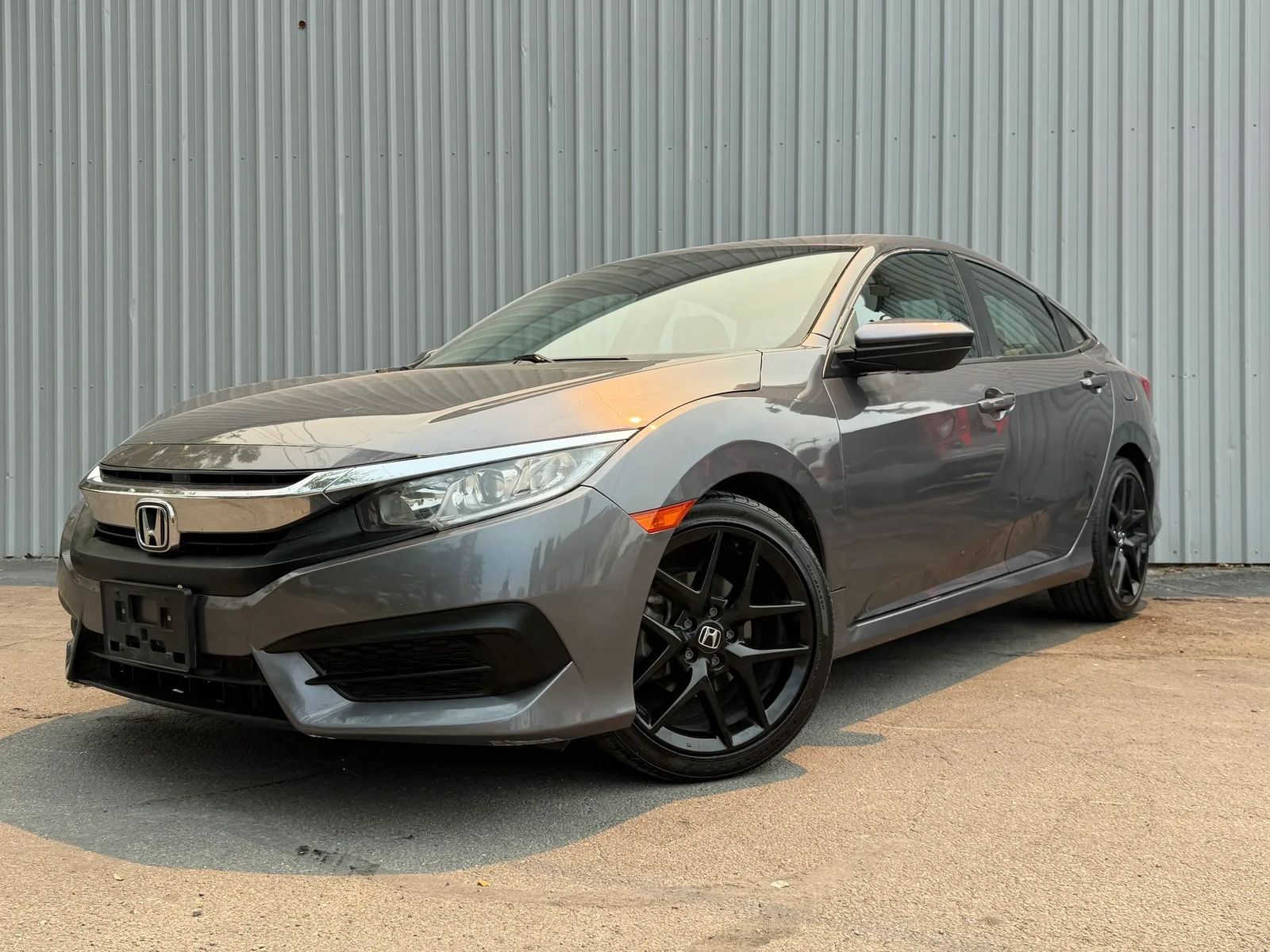 2018 Honda Civic LX — rebuilt & branded title, 19% below market