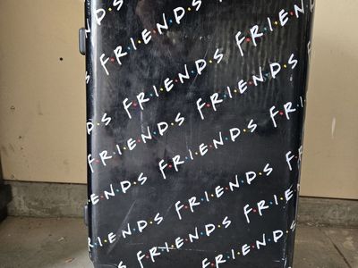 Friends themed hard shell rolling suitcase