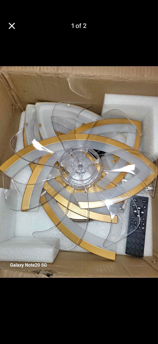 Gold and white ceiling fan