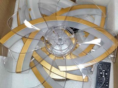 Gold and white ceiling fan
