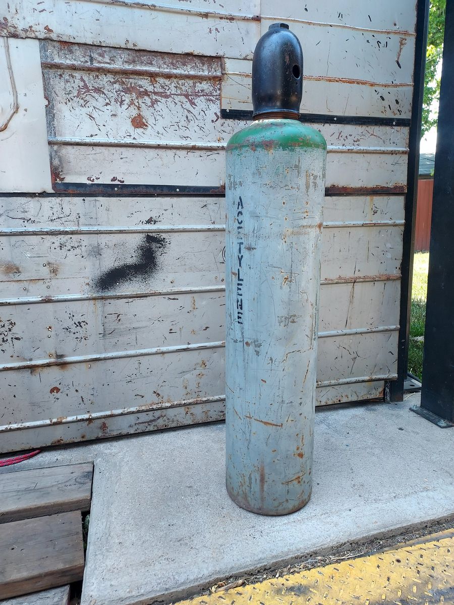Acetylene bottle, gas tank.