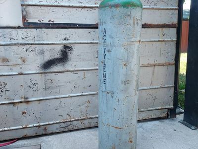 Acetylene bottle, gas tank.
