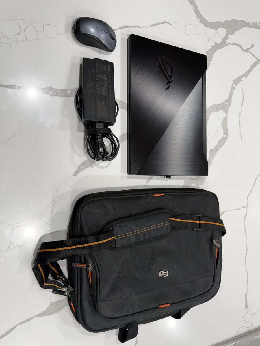 ASUS ROG Gaming Laptop with Charger, Mouse, and Solo Carrying Case