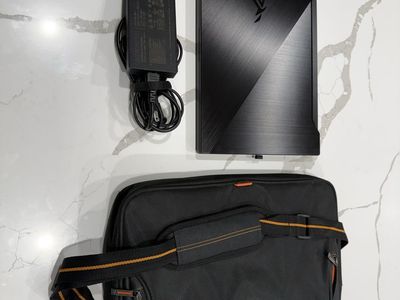 ASUS ROG Gaming Laptop with Charger, Mouse, and Solo Carrying Case