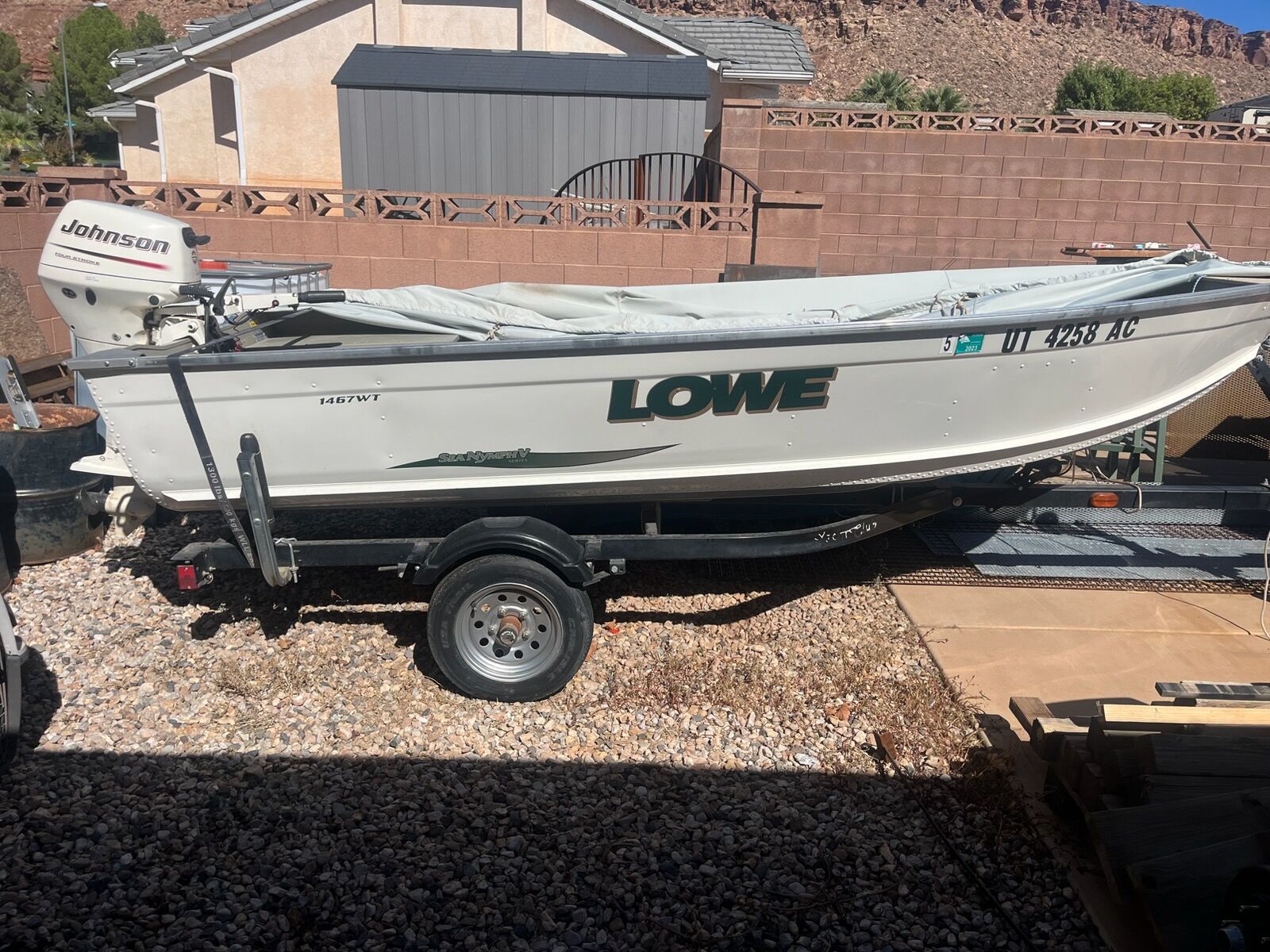 2004 Lowe Sea Nymph V 1467 WT Fishing Boat with Johnson 15 HP Motor