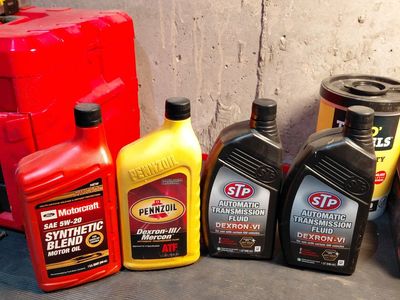 4 bottles new Dexron Transmission fluid and engine oil
