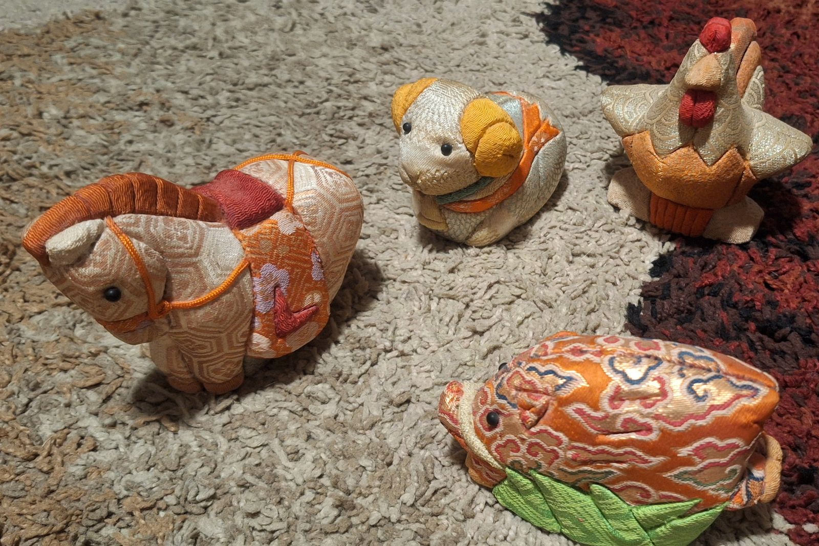 Traditional Japanese Kimekomi zodiac horse, dog, boar, and rooster figurine