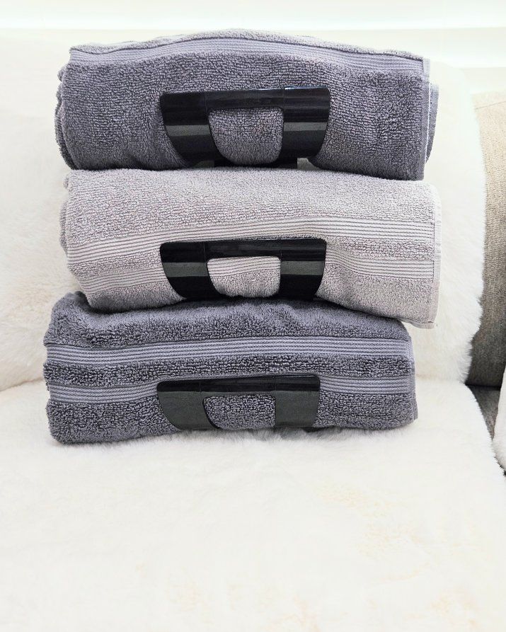 New Black Acrylic Wall-Mounted Towel Holder Rack with 3 Rolled Grey Towels