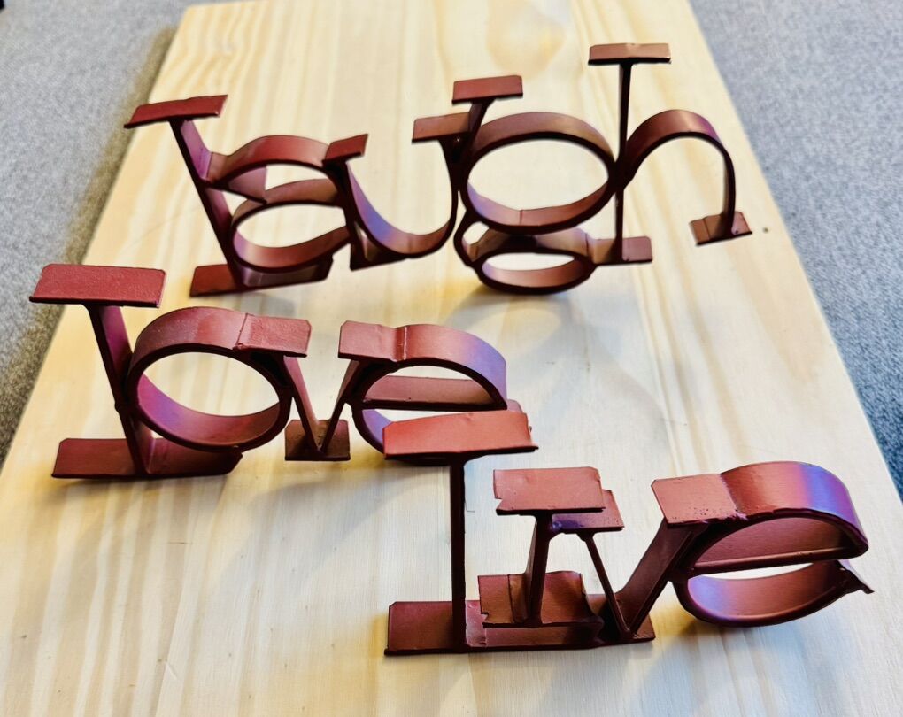 The LIVE~LAUGH~LOVE metal wall decor  $12