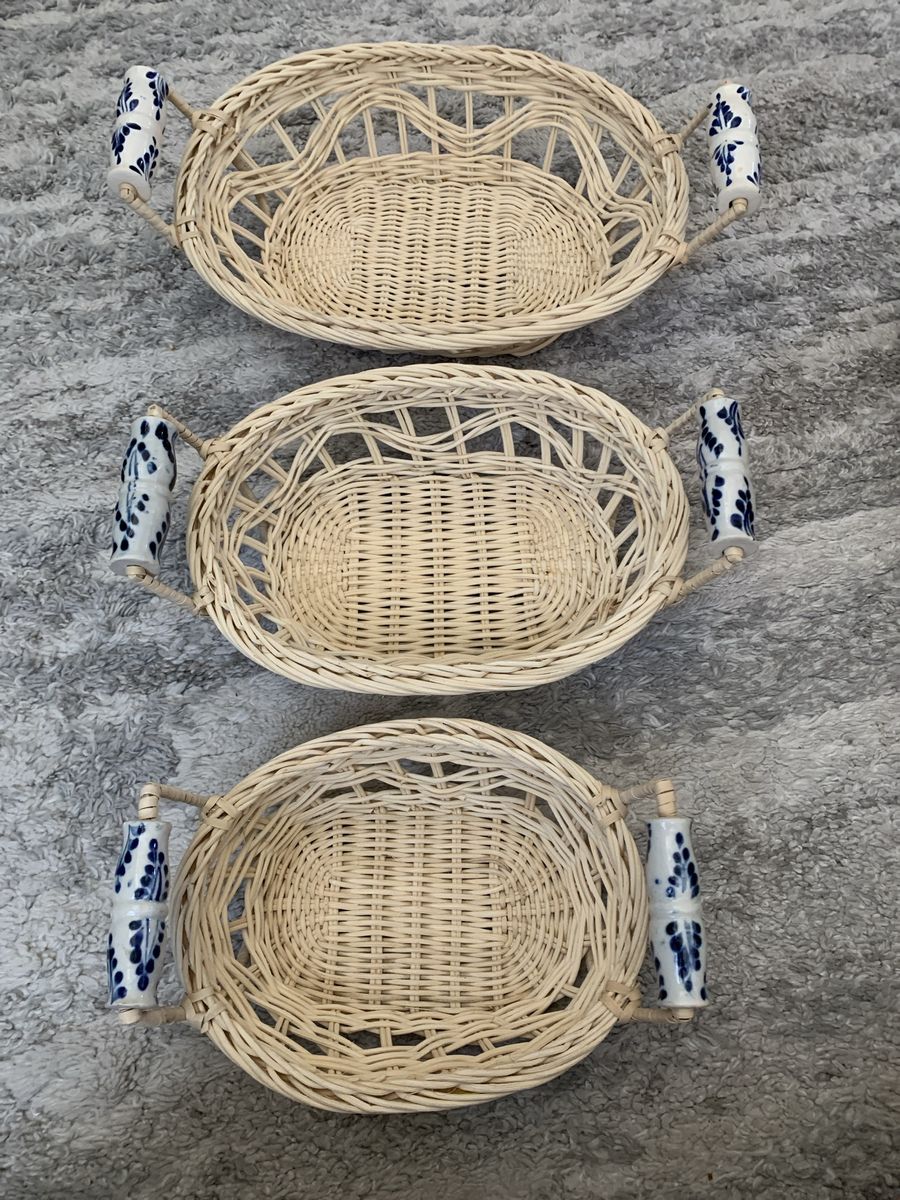 Stunning Vintage Hand Wooden Wicker Basket With Hand Painted Ceramic handles.  Set of 3 nesting baskets.