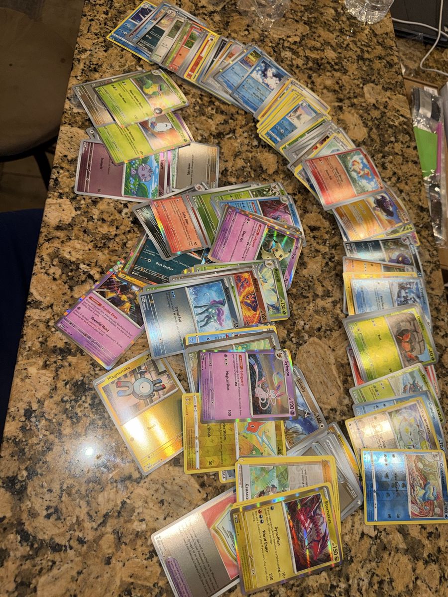 100 all shiny Holo & Foil Pokemon cards!