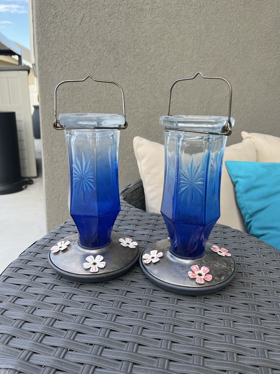 Two  Beautiful Blue Glass Hummingbird Feeders. 