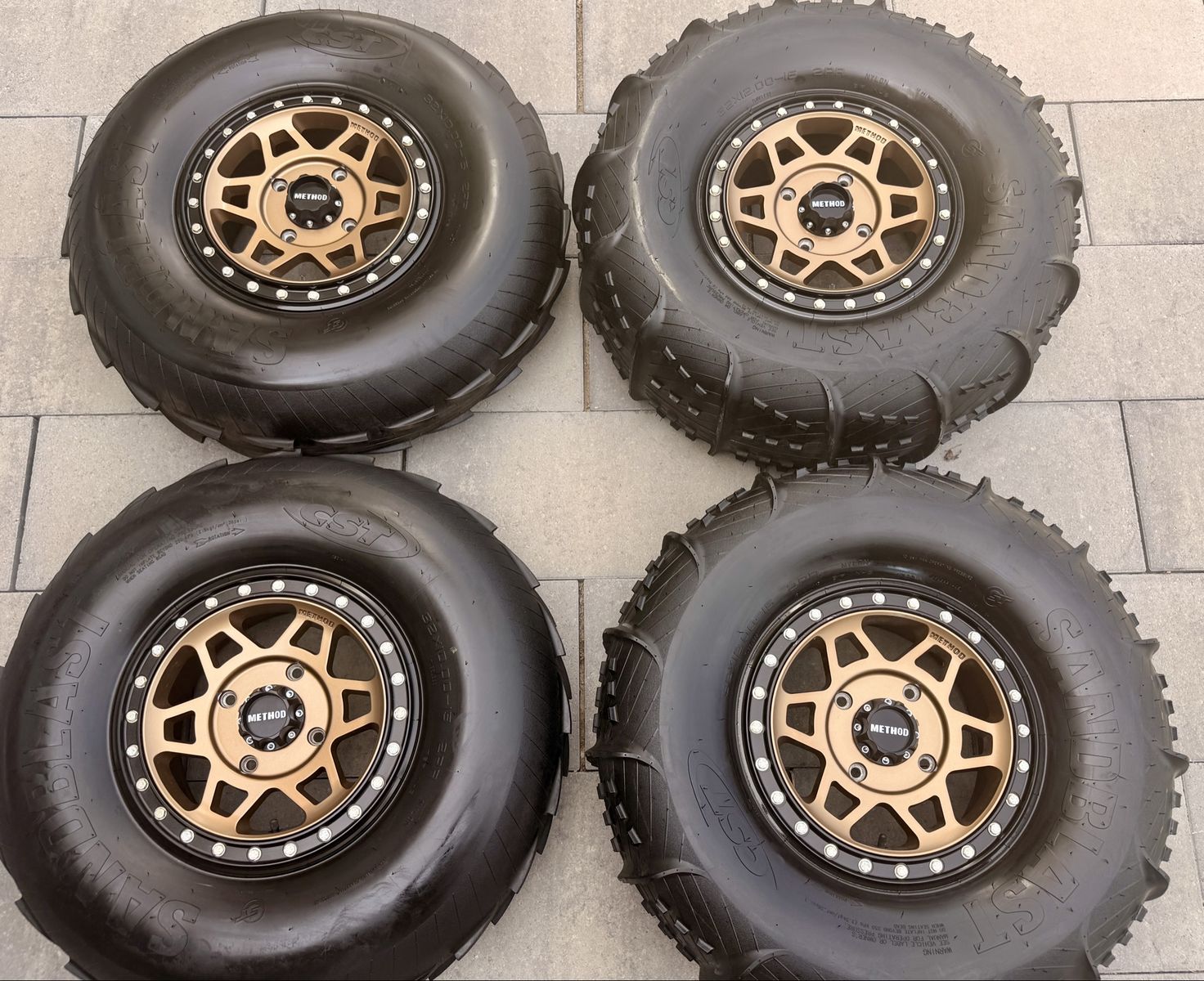CST Sandblast 32x10-15 Tires on Walker Evans Legend II 15x6 Beadlocks — Bronze/Satin Black — Can-Am X3 — No Damage