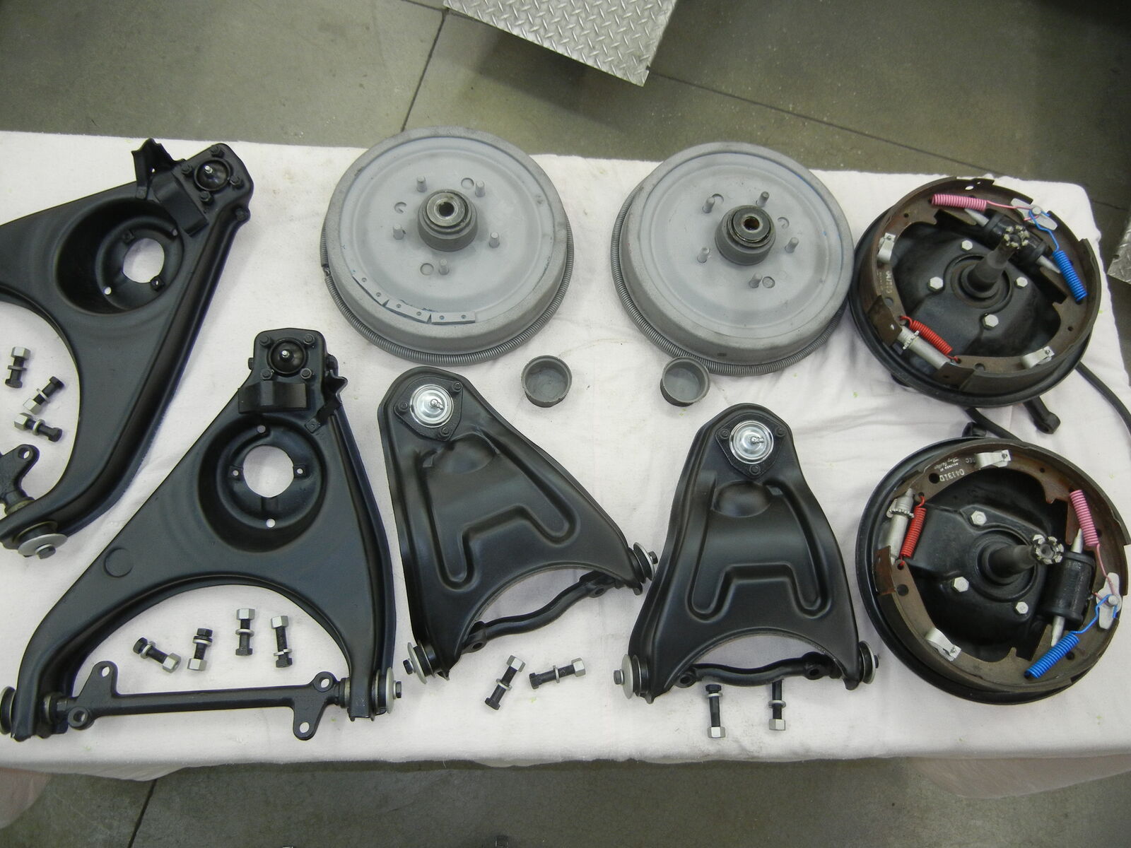 Chevy 1955-56-57 Car A-Arms with Hubs and Brakes Restored