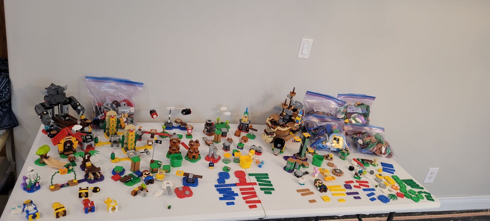 14 Lego Mario sets including Mario and Luigi