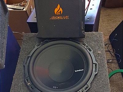 several subwoofer and amp combos for sale