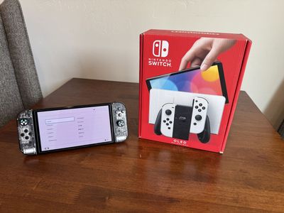 Nintendo Switch OLED Bundle - Four JoyCons, Pro Controller, 2 TB SD