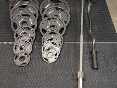 Weights 255 pounds plus barbells