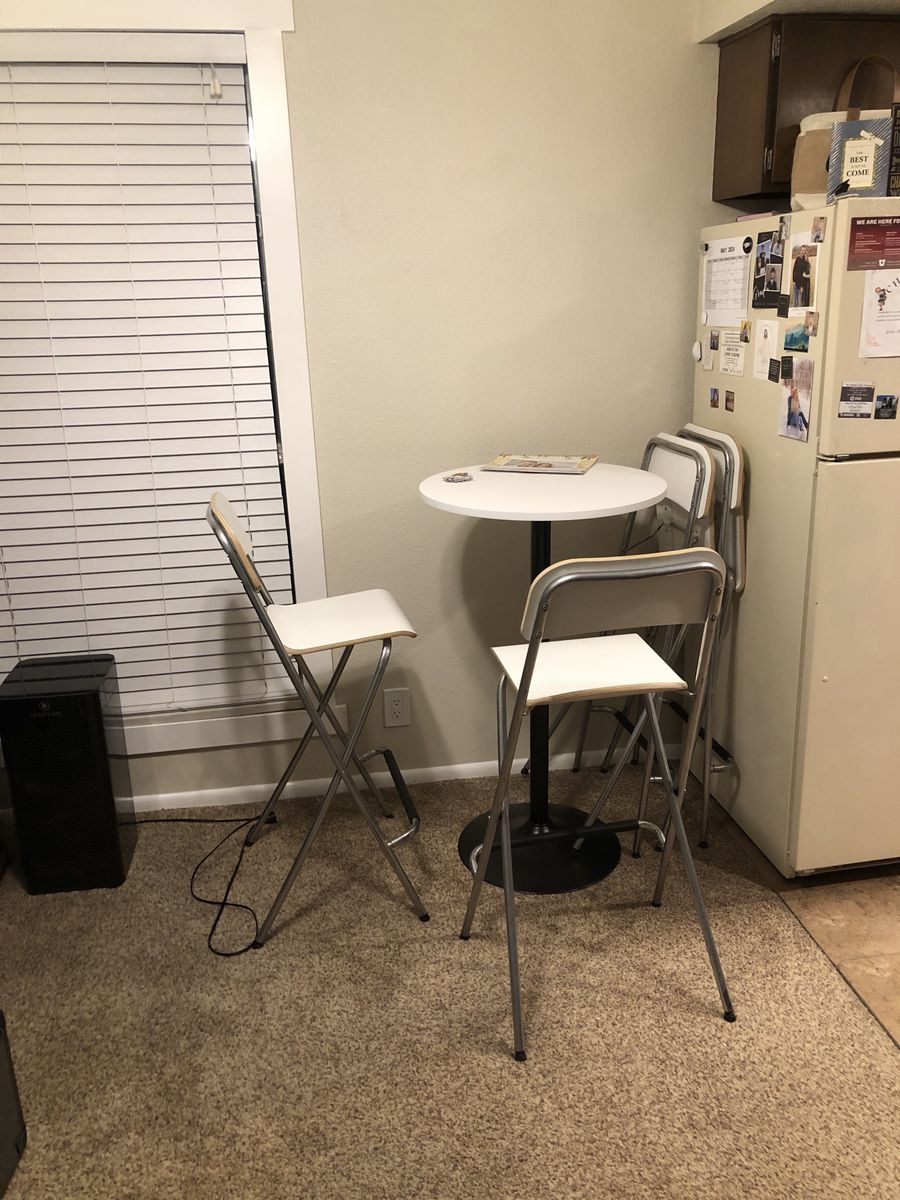 Small round table + 4 chairs
